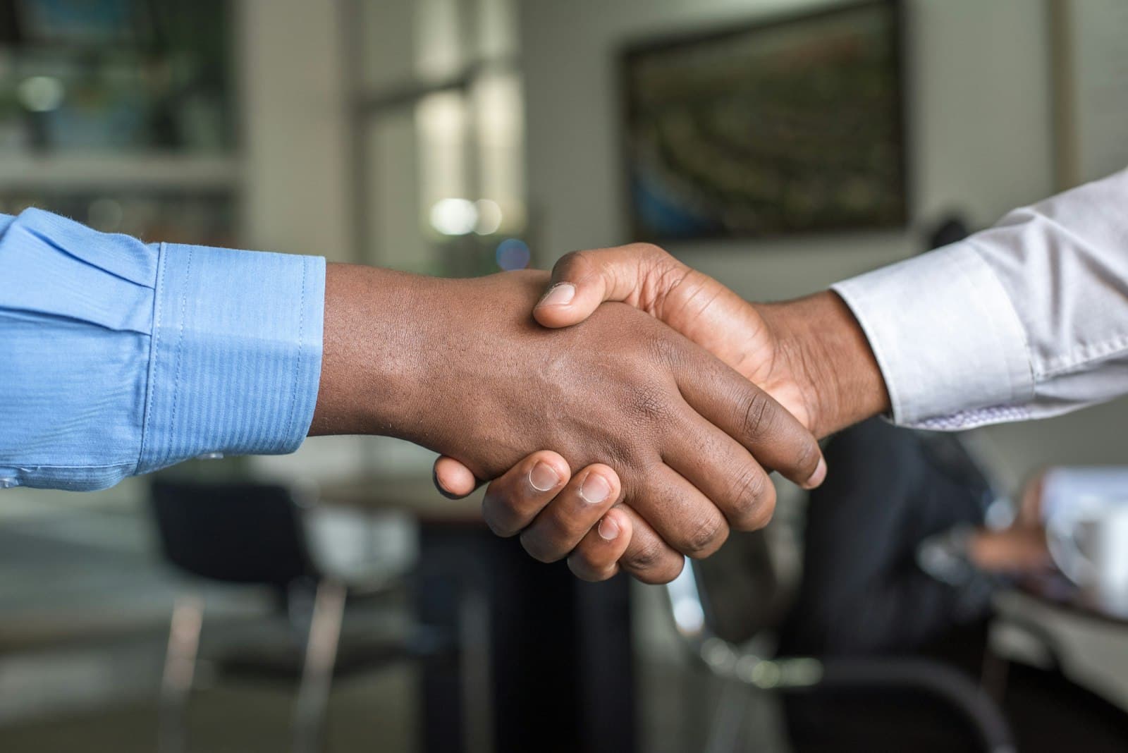 A handshake on signing an insurance policy